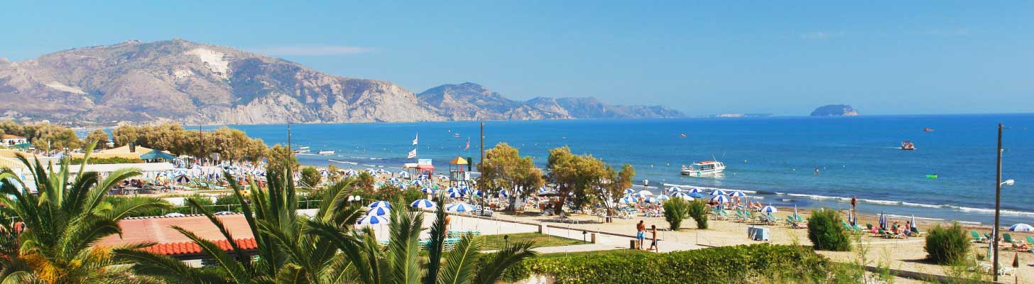 Golden sands & blue waters of Laganas beach in Zante