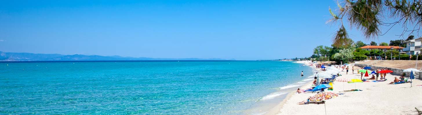 White sands & crystal clear waters of Hanioti beach in Halkidiki