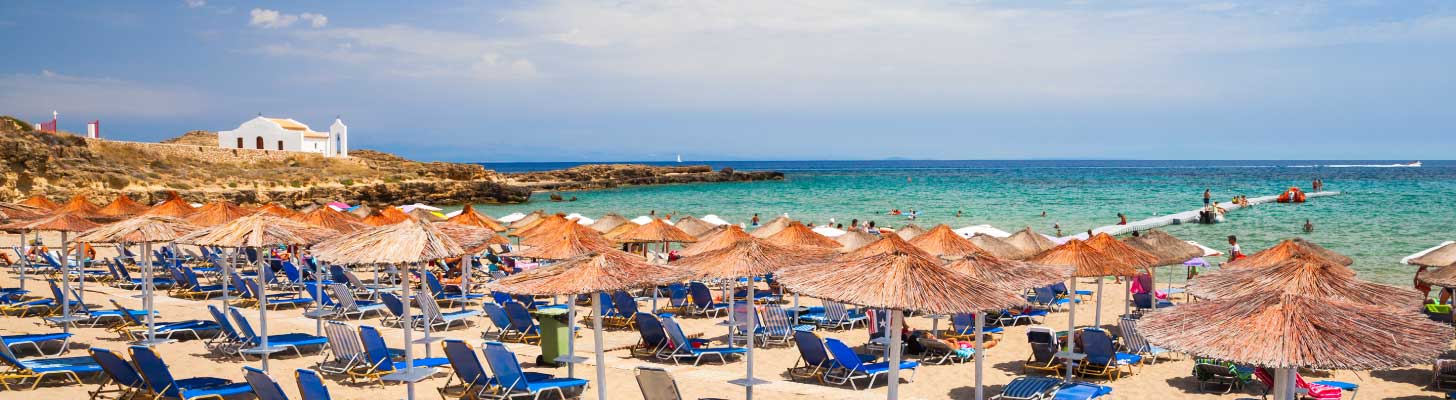 Sun loungers & umbrellas on the beach at Vassilikos in Zante