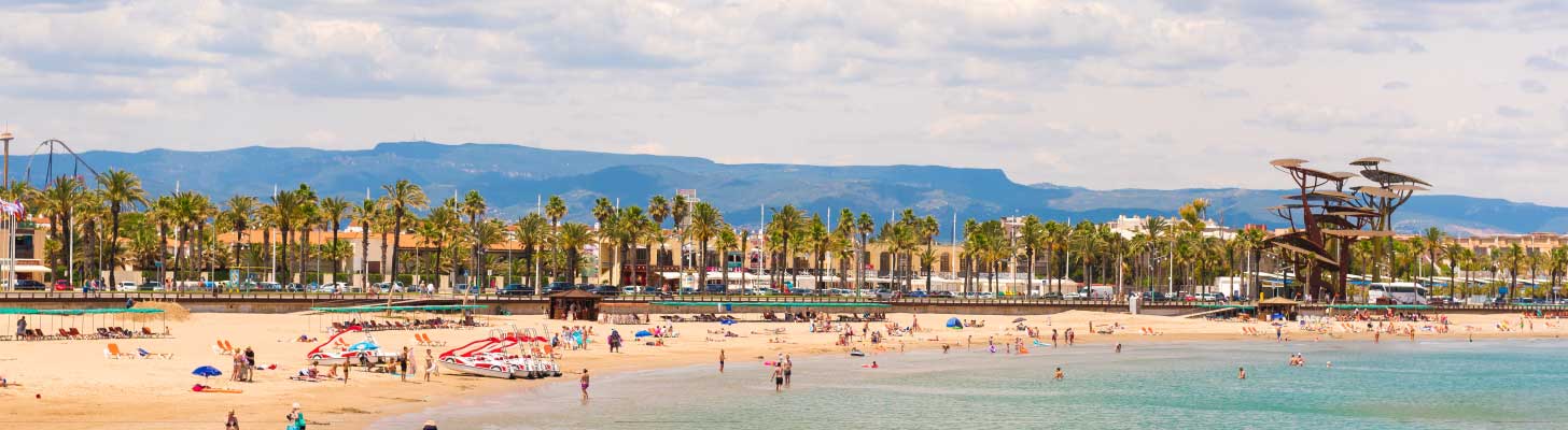 Holiday makers on the beach at La Pineda, Costa Dorada
